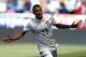 ADVANCE FOR WEEKEND EDITIONS, JUNE 14-15 - FILE - In this June 1, 2014 file photo, United States' Fabian Johnson celebrates after scoring a goal against Turkey in the first half of an international friendly soccer match in Harrison, N.J. Johnson is one of five German-Americans playing on the American World Cup team. (AP Photo/Julio Cortez, File)