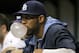 Jun 17, 2014; St. Petersburg, FL, USA; Tampa Bay Rays starting pitcher David Price (14) blows a bubble gum bubble in the dugout against the Baltimore Orioles at Tropicana Field. Baltimore Orioles defeated the Tampa Bay Rays 7-5. Mandatory Credit: Kim Klement-USA TODAY Sports