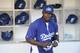 SAN DIEGO, CA - JUNE 20: Yasiel Puig #66 of the Los Angeles Dodgers gets ready for batting practice before a baseball game against the San Diego Padres at Petco Park June 20, 2014 in San Diego, California. (Photo by Denis Poroy/Getty Images)