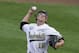 Vanderbilt pitcher Carson Fulmer (15) works against Louisville in the first inning of an NCAA baseball College World Series game in Omaha, Neb., Saturday, June 14, 2014. (AP Photo/Nati Harnik)