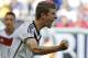 Germany's Thomas Mueller celebrates after scoring the opening goal during the group G World Cup soccer match between Germany and Portugal at the Arena Fonte Nova in Salvador, Brazil, Monday, June 16, 2014. (AP Photo/Matthias Schrader)