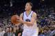 Apr 6, 2014; Oakland, CA, USA; Golden State Warriors guard Klay Thompson (11) shoots the ball against the Utah Jazz during the second quarter at Oracle Arena. The Warriors defeated the Jazz 130-102. Mandatory Credit: Kyle Terada-USA TODAY Sports