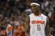 Syracuse forward C.J. Fair (5) reacts late in the second half of a third-round game against Dayton in the NCAA men's college basketball tournament in Buffalo, N.Y., Saturday, March 22, 2014. Dayton won the game 55-53. (AP Photo/Bill Wippert)