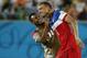 Jun 16, 2014; Natal, Rio Grande do Norte, BRAZIL; United States defender John Brooks (6) is hugged by midfielder Julian Green (16) after his goal beat Ghana 2-1 during their 2014 World Cup game at Estadio das Dunas. Mandatory Credit: Winslow Townson-USA TODAY Sports