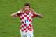 MANAUS, BRAZIL - JUNE 18: Mario Mandzukic of Croatia celebrates scoring the third goal during the 2014 FIFA World Cup Brazil Group A match between Cameroon and Croatia at Arena Amazonia on June 18, 2014 in Manaus, Brazil. (Photo by Stu Forster/Getty Images)