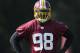 Washington Redskins linebacker Brian Orakpo (98) looks on during NFL football minicamp, Wednesday, June 18, 2014, in Ashburn, Va. (AP Photo/Nick Wass)