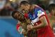 Jun 16, 2014; Natal, Rio Grande do Norte, BRAZIL; United States defender John Brooks (6) is hugged by midfielder Julian Green (16) after his winning goal to beat Ghana 2-1 during their 2014 World Cup game at Estadio das Dunas. Mandatory Credit: Winslow Townson-USA TODAY Sports
