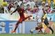 Ghana's Christian Atsu, left, gets away from Germany's Mats Hummels during the group G World Cup soccer match at the Arena Castelao in Fortaleza, Brazil, Saturday, June 21, 2014. (AP Photo/Matthias Schrader)