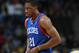 Philadelphia 76ers forward Thaddeus Young takes court to face the Denver Nuggets in the first quarter of an NBA basketball game in Denver on Wednesday, Jan. 1, 2014. (AP Photo/David Zalubowski)