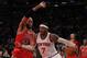 Dec 11, 2013; New York, NY, USA; Chicago Bulls power forward Taj Gibson (22) defends against New York Knicks small forward Carmelo Anthony (7) in the second half of NBA game at Madison Square Garden. Mandatory Credit: Noah K. Murray-USA TODAY Sports