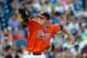Jun 17, 2014; Omaha, NE, USA; Virginia Cavaliers pitcher Brandon Waddell (20) pitches against the TCU Horned Frogs during game eight of the 2014 College World Series at TD Ameritrade Park Omaha. Virginia defeated TCU 3-2 in 15 innings. Mandatory Credit: Steven Branscombe-USA TODAY Sports