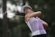 Michelle Wie watches her tee shot on the 14th hole during the third round of the U.S. Women's Open golf tournament in Pinehurst, N.C., Saturday, June 21, 2014. (AP Photo/John Bazemore)