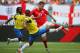 MIAMI GARDENS, FL - JUNE 04: Luke Shaw of England and Jorge Guagua of Ecuador battle for the ball during the International friendly match between England and Ecuador at Sun Life Stadium on June 4, 2014 in Miami Gardens, Florida. (Photo by Richard Heathcote/Getty Images)