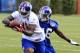 New York Giants tight end Adrien Robinson (81), a fourth-round draft pick, catches a pass in front of safety Jojo Nicolas (46) during a drill at the team's NFL football rookie minicamp in East Rutherford, N.J., Friday, May 11, 2012. (AP Photo/Mel Evans)