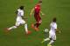 MANAUS, BRAZIL - JUNE 22: Cristiano Ronaldo of Portugal controls the ball against Jermaine Jones (L) and Kyle Beckerman of the United States during the 2014 FIFA World Cup Brazil Group G match between the United States and Portugal at Arena Amazonia on June 22, 2014 in Manaus, Brazil. (Photo by Elsa/Getty Images)