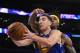 Golden State Warriors guard Klay Thompson goes to the basket as Los Angeles Lakers forward Jordan Hill defends during the second half of an NBA basketball game, Friday, April 11, 2014, in Los Angeles. The Warriors won 112-95. (AP Photo/Mark J. Terrill)