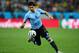 SAO PAULO, BRAZIL - JUNE 19: Luis Suarez of Uruguay kicks the ball during the 2014 FIFA World Cup Brazil Group D match between Uruguay and England at Arena de Sao Paulo on June 19, 2014 in Sao Paulo, Brazil. (Photo by Julian Finney/Getty Images)