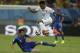 England's Raheem Sterling, top, is challenged by Italy's Matteo Darmian during the group D World Cup soccer match between England and Italy at the Arena da Amazonia in Manaus, Brazil, Saturday, June 14, 2014. (AP Photo/Martin Mejia)