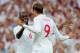 Ledley King and Peter Crouch, then of Tottenham Hotspur, look really unhappy representing England in their 3-1 win over Mexico in May 2010.