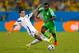 CUIABA, BRAZIL - JUNE 21: Muhamed Besic of Bosnia and Herzegovina tackles Juwon Oshaniwa during the 2014 FIFA World Cup Group F match between Nigeria and Bosnia-Herzegovina at Arena Pantanal on June 21, 2014 in Cuiaba, Brazil. (Photo by Phil Walter/Getty Images)