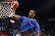 Feb 8, 2014; Lawrence, KS, USA; Kansas Jayhawks center Joel Embiid (21) warms up before the game against the West Virginia Mountaineers at Allen Fieldhouse. Mandatory Credit: Denny Medley-USA TODAY Sports