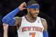 New York Knicks' Carmelo Anthony smiles during the third quarter of an NBA basketball game against the Cleveland Cavaliers Thursday, Jan. 30, 2014, at Madison Square Garden in New York. The Knicks won 117-86. (AP Photo/Bill Kostroun)