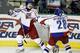 GRAND FORKS, ND - JANUARY 4: Petr Vrana #20 and Jakub Petruzalek #28 of the Czech Republic celebrate after defeating the USA in the bronze medal game at the World Junior Hockey Championships on January 4, 2005 at the Ralph Engelstad Arena in Grand Forks, North Dakota. The Czech Republic defeated the USA 3-2 to win the bronze medal. (Photo by Lyle Stafford/Getty Images)
