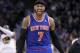 Mar 30, 2014; Oakland, CA, USA; New York Knicks forward Carmelo Anthony (7) reacts on the court against the Golden State Warriors in the fourth quarter at Oracle Arena. The Knicks won 89-84. Mandatory Credit: Cary Edmondson-USA TODAY Sports
