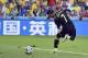 Spain's David Villa scores the opening goal during the group B World Cup soccer match between Australia and Spain at the Arena da Baixada in Curitiba, Brazil, Monday, June 23, 2014. (AP Photo/Martin Meissner)