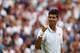 LONDON, ENGLAND - JUNE 23: Novak Djokovic of Serbia celebrates after defeating Andrey Golubev of Kazakhstan in three straight sets during their Gentlemen's Singles first round match on day one of the Wimbledon Lawn Tennis Championships at the All England Lawn Tennis and Croquet Club at Wimbledon on June 23, 2014 in London, England. (Photo by Matthew Stockman/Getty Images)