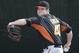 San Francisco Giants invitee pitcher Kyle Crick throws during spring training baseball practice Sunday, Feb. 16, 2014, in Scottsdale, Ariz. (AP Photo/Gregory Bull)
