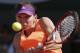 Romania's Simona Halep returns the ball during final of the French Open tennis tournament against Russia's Maria Sharapova at the Roland Garros stadium, in Paris, France, Saturday, June 7, 2014. (AP Photo/Michel Euler)