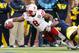 ANN ARBOR, MI - NOVEMBER 09: Ameer Abdullah #8 of the Nebraska Cornhuskers stretches over the goal line for a first-quarter touchdown against the Michigan Wolverines at Michigan Stadium on November 9, 2013 in Ann Arbor, Michigan. (Photo by Gregory Shamus/Getty Images)