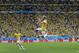 Brazil's Neymar leaps in the air to celebrate after scoring his side's second goal during the group A World Cup soccer match between Cameroon and Brazil at the Estadio Nacional in Brasilia, Brazil, Monday, June 23, 2014. (AP Photo/Bernat Armangue)