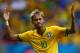 BRASILIA, BRAZIL - JUNE 23: Neymar of Brazil celebrates scoring his team's second goal and his second of the game during the 2014 FIFA World Cup Brazil Group A match between Cameroon and Brazil at Estadio Nacional on June 23, 2014 in Brasilia, Brazil. (Photo by Clive Brunskill/Getty Images)