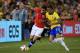 TORONTO, ON - NOVEMBER 19: Eduardo Vargas #11 of Chile carries the ball up field as Luiz Gustavo #17 of Brazil defends during a friendly match at Rogers Centre on November 19, 2013 in Toronto, Canada. (Photo by Dave Sandford/Getty Images)
