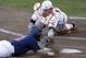 Vanderbilt first baseman Zander Wiel, front, slides safely into home plate for a run against Virginia catcher Nate Irving in the third inning of game one of the best-of-three NCAA baseball College World Series finals in Omaha, Neb., Monday, June 23, 2014. (AP Photo/Nati Harnik)