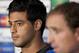Real Sociedad's Carlos Vela, left, sits alongside coach Jagoba Arrasate during a press conference at Manchester United's Old Trafford Stadium, Manchester, England, Tuesday, Oct. 22, 2013. Real Sociedad will play Manchester United in a Champion's League Group A soccer match on Wednesday. (AP Photo/Jon Super)