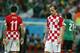CORRECTS FINAL SCORE TO 3-1 Croatia's Ivan Rakitic (7) reacts at the end of the group A World Cup soccer match between Croatia and Mexico at the Arena Pernambuco in Recife, Brazil, Monday, June 23, 2014. Mexico won 3-1. (AP Photo/Eduardo Verdugo)