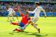 BELO HORIZONTE, BRAZIL - JUNE 24: Adam Lallana of England is challenged by Oscar Duarte of Costa Rica during the 2014 FIFA World Cup Brazil Group D match between Costa Rica and England at Estadio Mineirao on June 24, 2014 in Belo Horizonte, Brazil. (Photo by Richard Heathcote/Getty Images)