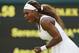 Serena Williams of U.S. celebrates after winning a point against Anna Tatishvili of U.S. in their match at the All England Lawn Tennis Championships in Wimbledon, London, Tuesday, June 24, 2014. (AP Photo/Sang Tan)