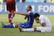 Italy's Giorgio Chiellini complains after Uruguay's Luis Suarez ran into his shoulder with his teeth during the group D World Cup soccer match between Italy and Uruguay at the Arena das Dunas in Natal, Brazil, Tuesday, June 24, 2014. (AP Photo/Ricardo Mazalan)