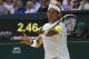 Rafael Nadal of Spain plays a return to Martin Klizan of Slovakia during their match at the All England Lawn Tennis Championships in Wimbledon, London, Tuesday, June 24, 2014. (AP Photo/Sang Tan)
