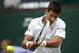 Novak Djokovic of Serbia plays a return to Andrey Golubev of Kazakhstan during their first round match at the All England Lawn Tennis Championships in Wimbledon, London, Monday, June 23, 2014. (AP Photo/Pavel Golovkin)