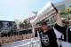 LOS ANGELES, CA - JUNE 16: Jonathan Quick #32 of the Los Angeles Kings celebrates during the Los Angeles Kings victory parade and rally on June 16, 2014 in Los Angeles, California. (Photo by Noah Graham/NHLI via Getty Images)