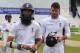 England's Moeen Ali, left, and James Anderson leave the field after Sri Lanka beat England by 100 runs to win the series during day five of the Second Test Match between England and Sri Lanka at Headingley cricket ground, Leeds, England, on Tuesday, June 24, 2014. (AP Photo/Rui Vieira)
