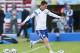 Argentina's Lionel Messi, right, kicks a ball during a training session at the Beira-Rio Stadium in Porto Alegre, Brazil, Tuesday, June 24, 2014. Argentina plays in group F of the 2014 soccer World Cup. (AP Photo/Victor R. Caivano)