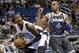 Charlotte Bobcats' Michael Kidd-Gilchrist, left, looks for an open shot as he is guarded by Orlando Magic's Arron Afflalo (4) in the first half of an NBA basketball game in Orlando, Fla., Friday, Jan. 17, 2014. (AP Photo/John Raoux)