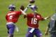 Minnesota Vikings quarterbacks Matt Cassel (16) and Teddy Bridgewater throw passes during an NFL mini camp in Eden Prairie, Minn., Tuesday, June 17, 2014. (AP Photo/Ann Heisenfelt)