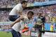 France's Mathieu Valbuena (8) jumps on Olivier Giroud's back after scoring his side's third goal during the group E World Cup soccer match between Switzerland and France at the Arena Fonte Nova in Salvador, Brazil, Friday, June 20, 2014. Giroud scored France's first goal. (AP Photo/Natacha Pisarenko)